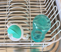 water bottle air drying on a dish rack