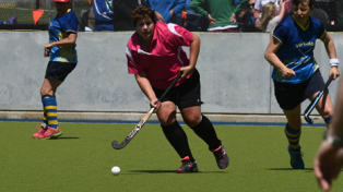 Sharee Taylor playing hockey at the Australian Masters Games